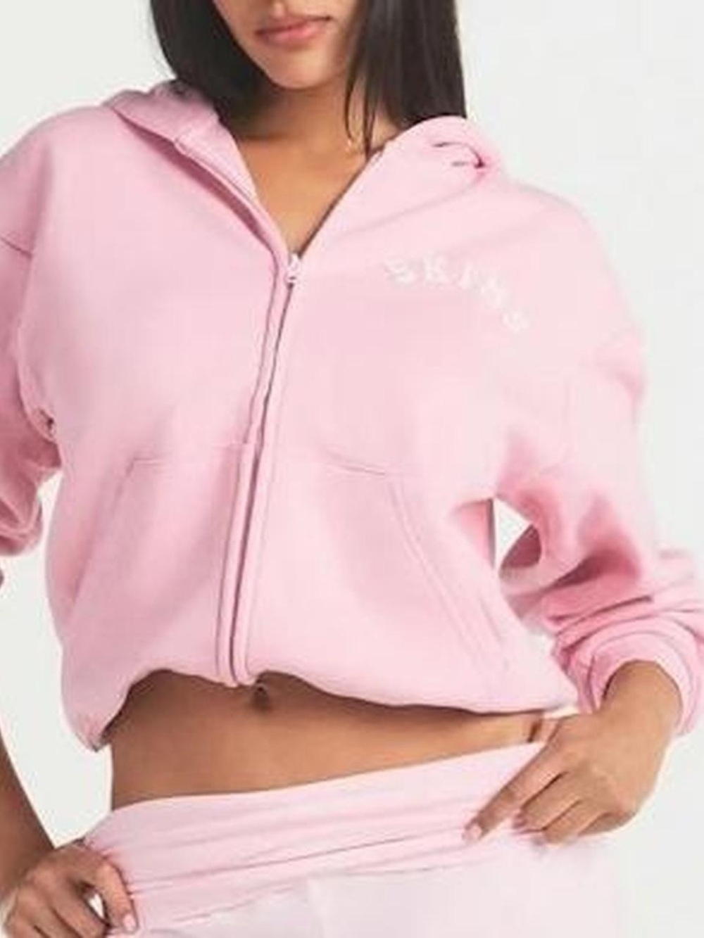 SKIMS Cotton Fleece Logo Classic Zip Up Hoodie in Pink. - Picture 8 of 8
